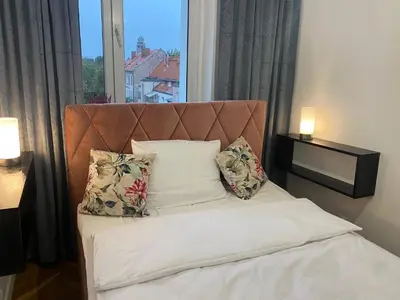 Łóżko lub łóżka w pokoju w obiekcie Tabago Studio 10