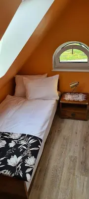 Łóżko lub łóżka w pokoju w obiekcie Czas relaksu