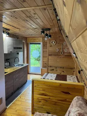 Kuchnia lub aneks kuchenny w obiekcie Chatka pod lasem