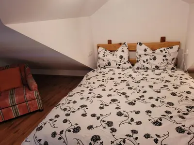 Łóżko lub łóżka w pokoju w obiekcie Domki Pod Brzoza