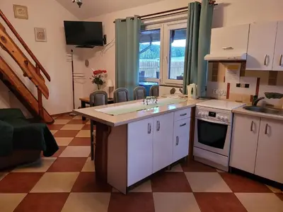 Kuchnia lub aneks kuchenny w obiekcie Domki Pod Brzoza