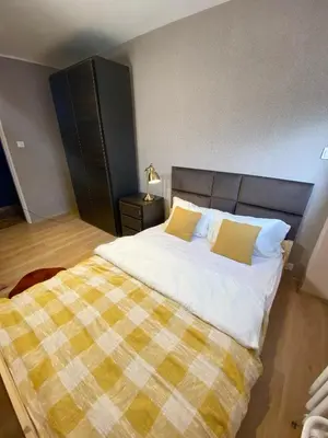 Łóżko lub łóżka w pokoju w obiekcie Apartament Panorama Centrum