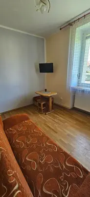Łóżko lub łóżka w pokoju w obiekcie Dobry Apartament