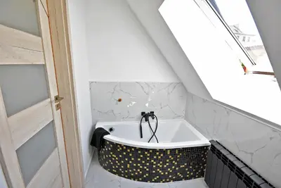 Łazienka w obiekcie Apartamenty Basztowa