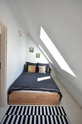 Łóżko lub łóżka w pokoju w obiekcie Apartamenty Basztowa