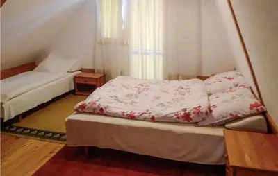 Łóżko lub łóżka w pokoju w obiekcie 1 Bedroom Cozy Home In Osolin