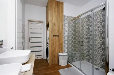 Łazienka w obiekcie Apartament przy Palmiarni