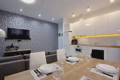 Kuchnia lub aneks kuchenny w obiekcie Apartament przy Palmiarni