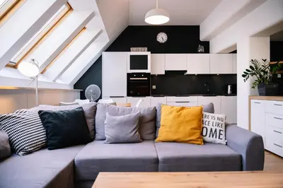 Kuchnia lub aneks kuchenny w obiekcie RentPlanet - Apartament Świętego Mikołaja