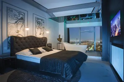 Łóżko lub łóżka w pokoju w obiekcie Sky Tower Apartamenty - In The Sky Apartments