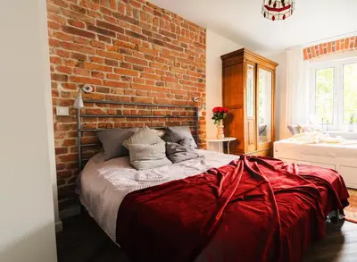 Łóżko lub łóżka w pokoju w obiekcie Pola Apartament Rodzinny