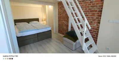 Łóżko lub łóżka w pokoju w obiekcie Apartament w Rynku