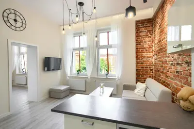 Telewizja i/lub zestaw kina domowego w obiekcie Apartament w Rynku