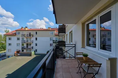 Balkon lub taras w obiekcie Peaceful Wrocław Apartment for 4 Guests with Balcony by Noclegi Renters
