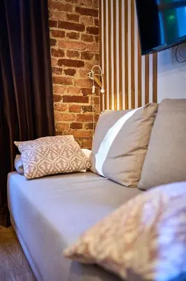 Łóżko lub łóżka w pokoju w obiekcie Marel-Apartament w parku Emma 6A Polanica Zdrój