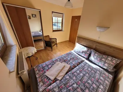 Łóżko lub łóżka w pokoju w obiekcie WILLA MONTE NEVE