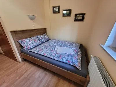 Łóżko lub łóżka w pokoju w obiekcie WILLA MONTE NEVE