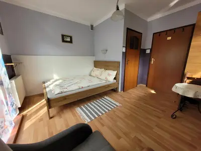 Łóżko lub łóżka w pokoju w obiekcie WILLA MONTE NEVE