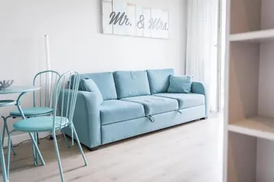 Część wypoczynkowa w obiekcie Apartament Pełen Wdzięku z balkonem