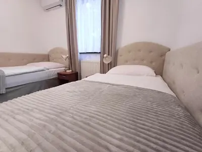 Łóżko lub łóżka w pokoju w obiekcie Hotel i Restauracja Borowianka