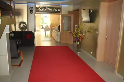 Hol lub recepcja w obiekcie Hotel Zielony & OW Borowik & Pensjonat Manhattan - Centrum Rekreacji i Wypoczynku GASTROTUR