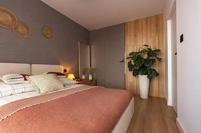 Łóżko lub łóżka w pokoju w obiekcie Apartament na Grabiszyńskiej