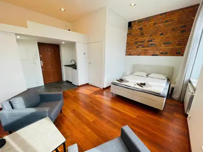 Łóżko lub łóżka w pokoju w obiekcie The Loft Premium Gliwice