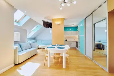 Łóżko lub łóżka w pokoju w obiekcie Marel-Apartament Błękitny sauna Polanica Zdrój