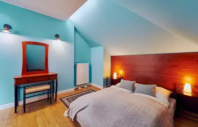 Łóżko lub łóżka w pokoju w obiekcie Marel-Apartament Błękitny sauna Polanica Zdrój