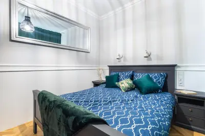 Łóżko lub łóżka w pokoju w obiekcie Świdnicka Deluxe Suite