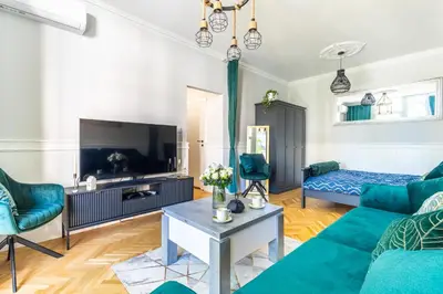 Telewizja i/lub zestaw kina domowego w obiekcie Świdnicka Deluxe Suite