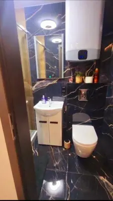Łazienka w obiekcie Rynek 23 LUX, apartament z widokiem na ratusz , parking free pod domem