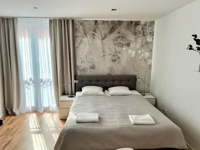 Łóżko lub łóżka w pokoju w obiekcie Apartament Kościuszki City Center by Apartamenty na dni Wrocław
