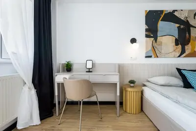 Łóżko lub łóżka w pokoju w obiekcie Kairos Apartments - Loft - darmowy parking, ścisłe centrum