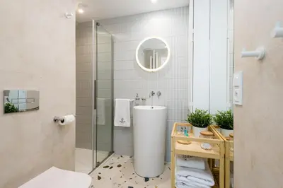 Łazienka w obiekcie Kairos Apartments - Loft - darmowy parking, ścisłe centrum