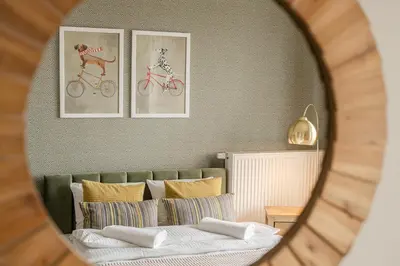 Łóżko lub łóżka w pokoju w obiekcie RentPlanet - Apartamenty Braniborska