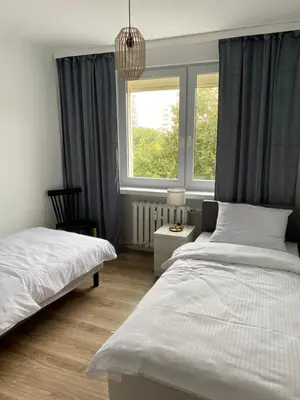 Łóżko lub łóżka w pokoju w obiekcie Tabago Studio 12
