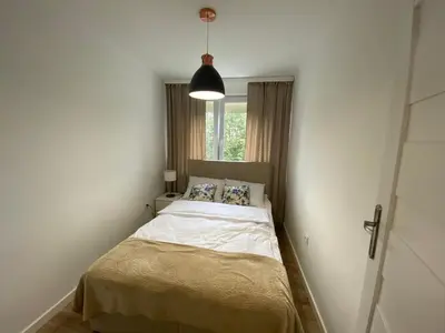 Łóżko lub łóżka w pokoju w obiekcie Tabago Studio 12