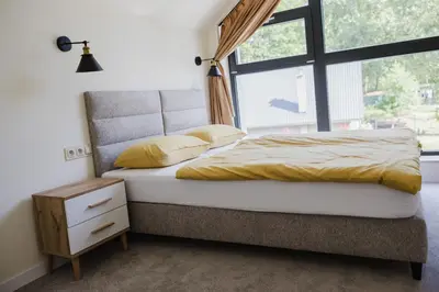 Łóżko lub łóżka w pokoju w obiekcie Presto Village