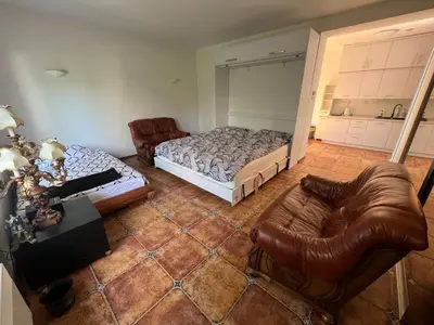Łóżko lub łóżka w pokoju w obiekcie Apartament Zloty Pociag