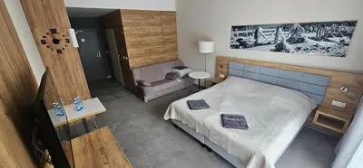 Łóżko lub łóżka w pokoju w obiekcie Apartament Panorama 123 Czarna Góra