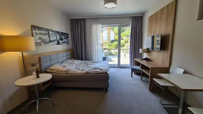 Łóżko lub łóżka w pokoju w obiekcie Apartament Panorama 123 Czarna Góra