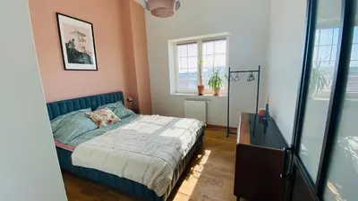 Łóżko lub łóżka w pokoju w obiekcie Apartament w Młynie Różanka