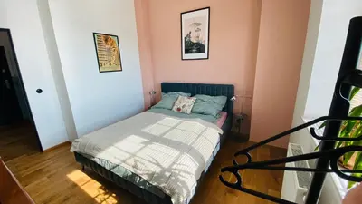 Łóżko lub łóżka w pokoju w obiekcie Apartament w Młynie Różanka