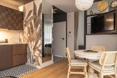 Telewizja i/lub zestaw kina domowego w obiekcie RentPlanet - Apartamenty Długa