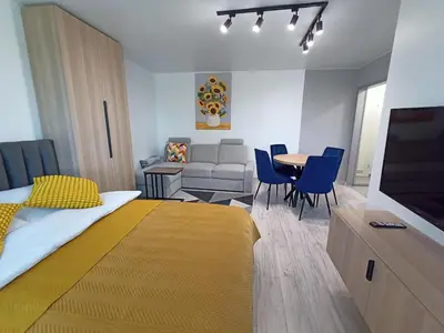 Łóżko lub łóżka w pokoju w obiekcie Apartament Zabrze Grzybowska