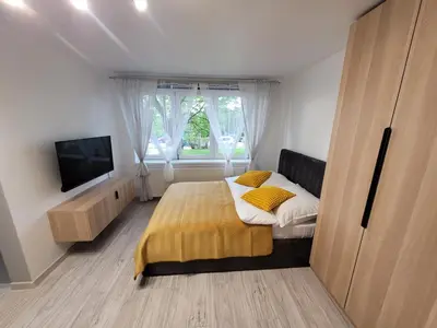 Łóżko lub łóżka w pokoju w obiekcie Apartament Zabrze Grzybowska