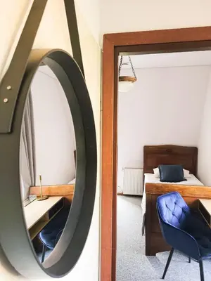 Łóżko lub łóżka w pokoju w obiekcie Winna Góra