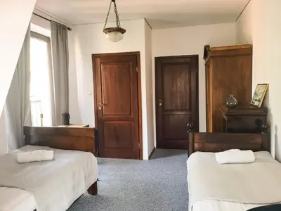 Łóżko lub łóżka w pokoju w obiekcie Winna Góra