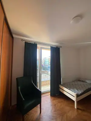 Łóżko lub łóżka w pokoju w obiekcie Apartament Celna